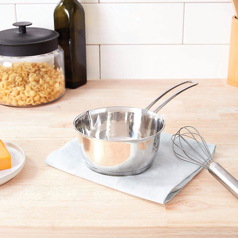 Küchenprofi bottom clad base promotes even heat distribution in compact pots.