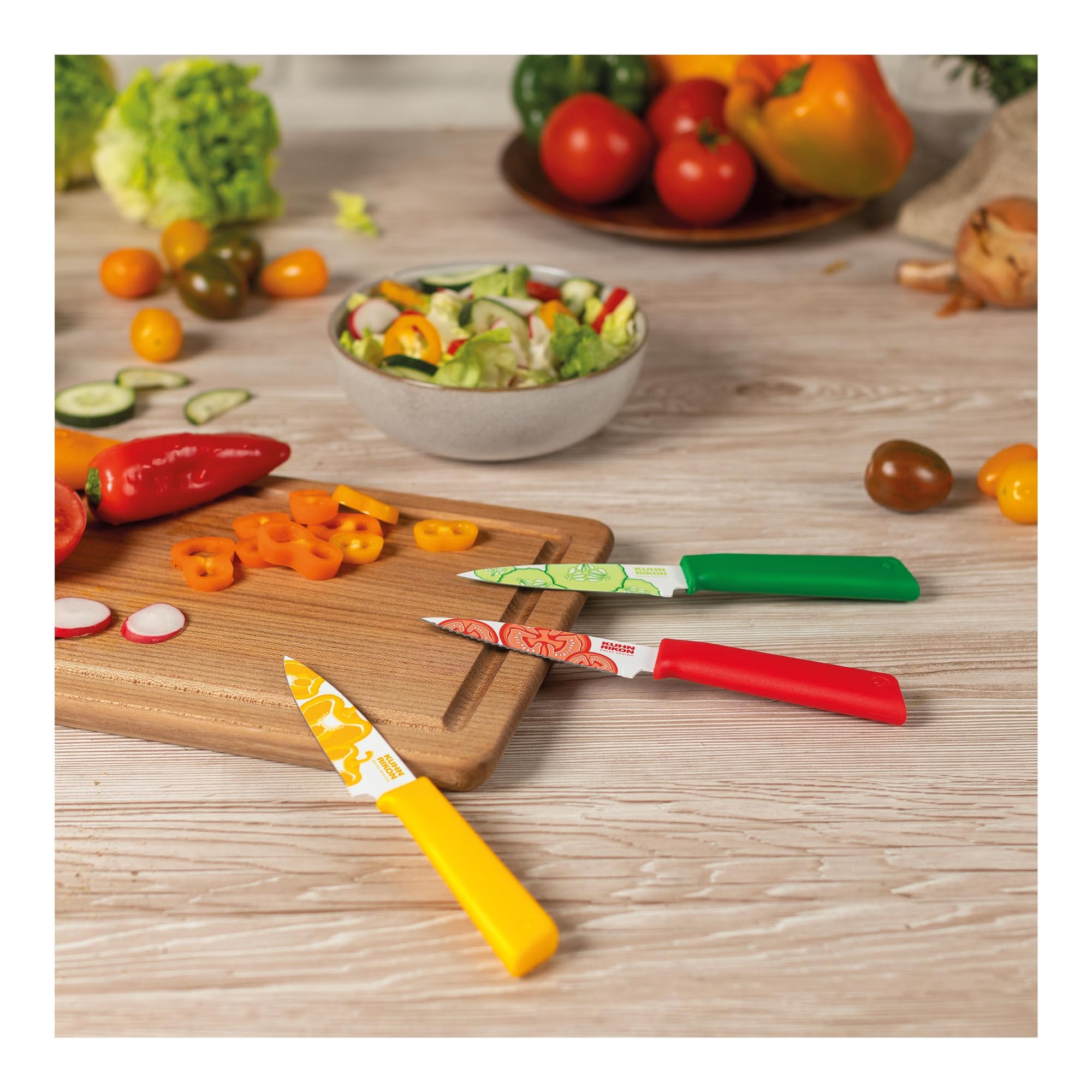 Kuhn Rikon Colori+ tomato knife with blade protector in place for safe storage