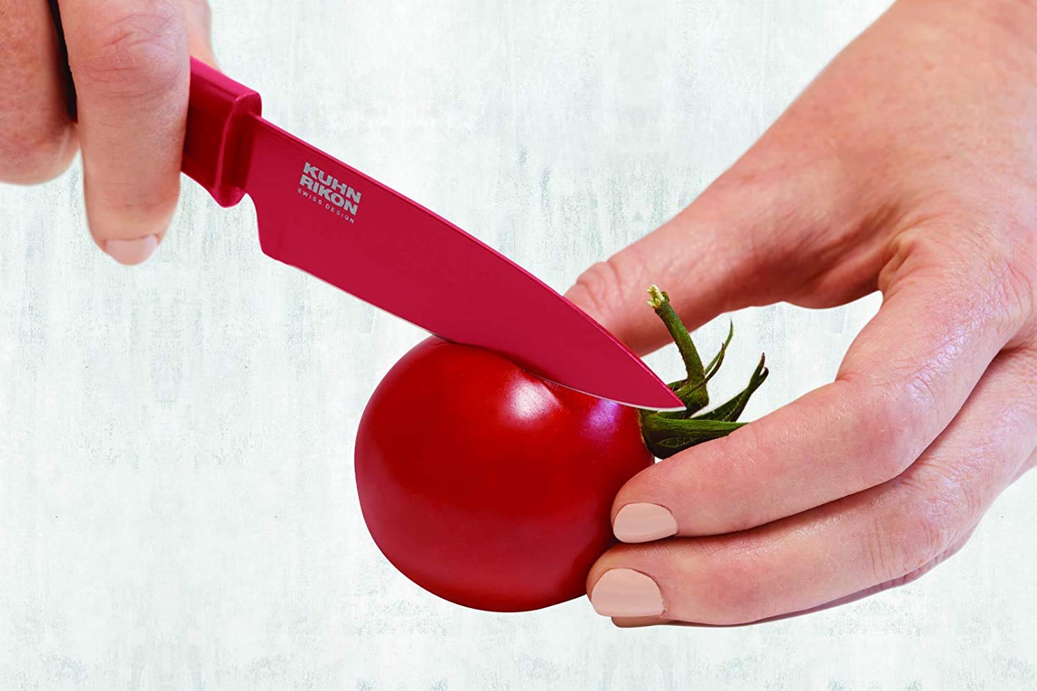 Blue COLORI paring knife ideal for delicate peeling and trimming tasks.