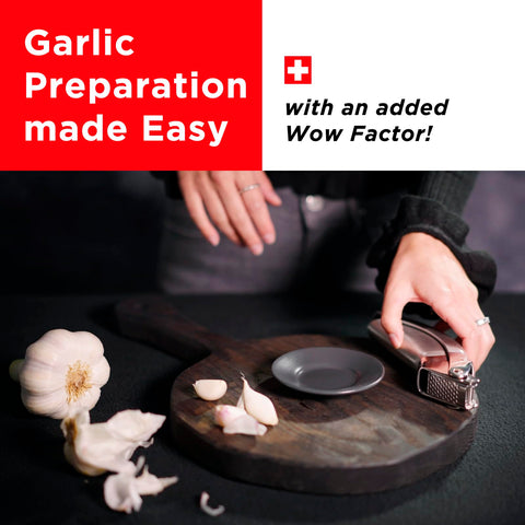 Kuhn Rikon Epicurean Garlic Press being rinsed easily after use