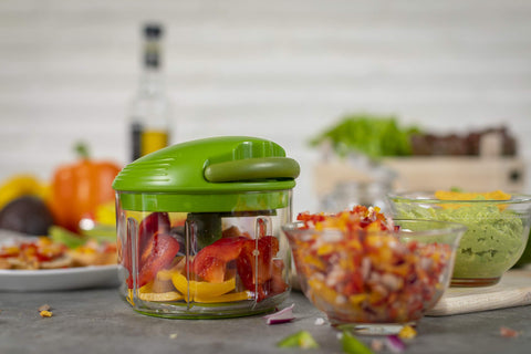 Dishwasher-safe container simplifies cleaning after chopping tasks with Kuhn Rikon Pull Chop.