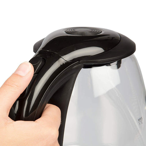 Kuissential electric water kettle blue LED illumination during use.
