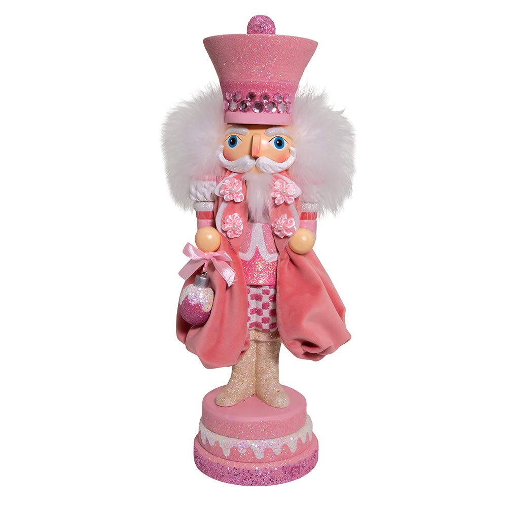 Kurt S. Adler pink ribbon flowers accent hat, boosting holiday charm.