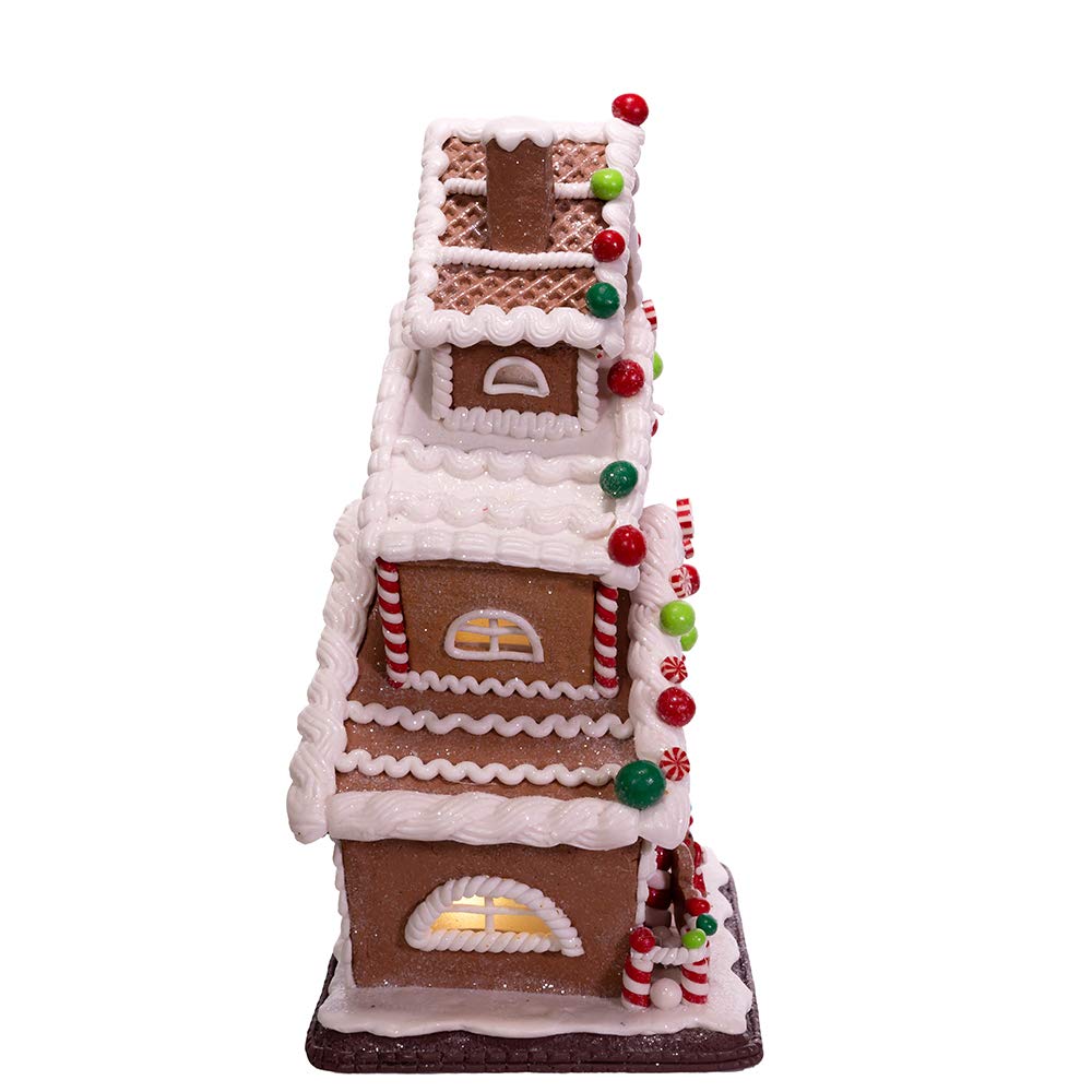 Kurt S. Adler gingerbread house interior illumination creates warm, inviting ambiance