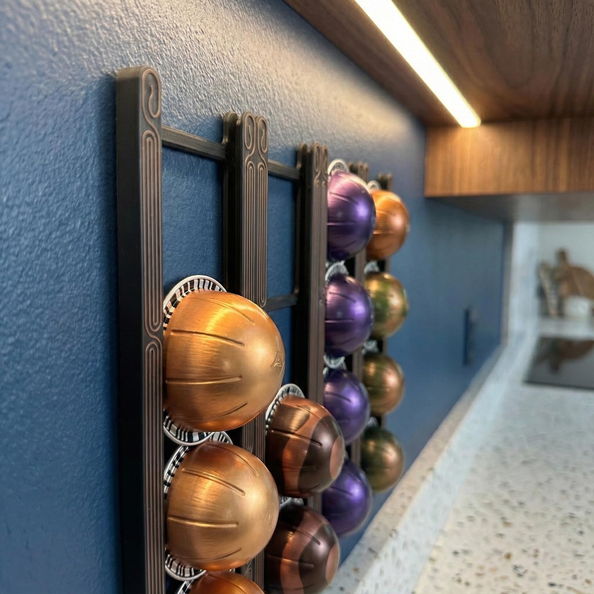 KUSOVILI under-cabinet pod holder mounted for space-saving organization.