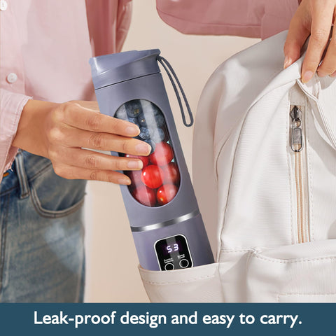 KUWEI portable blender pour action shows spill-free blending anywhere.