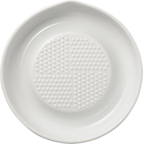 Kyocera ceramic grater with conical blades for fast ginger and garlic prep