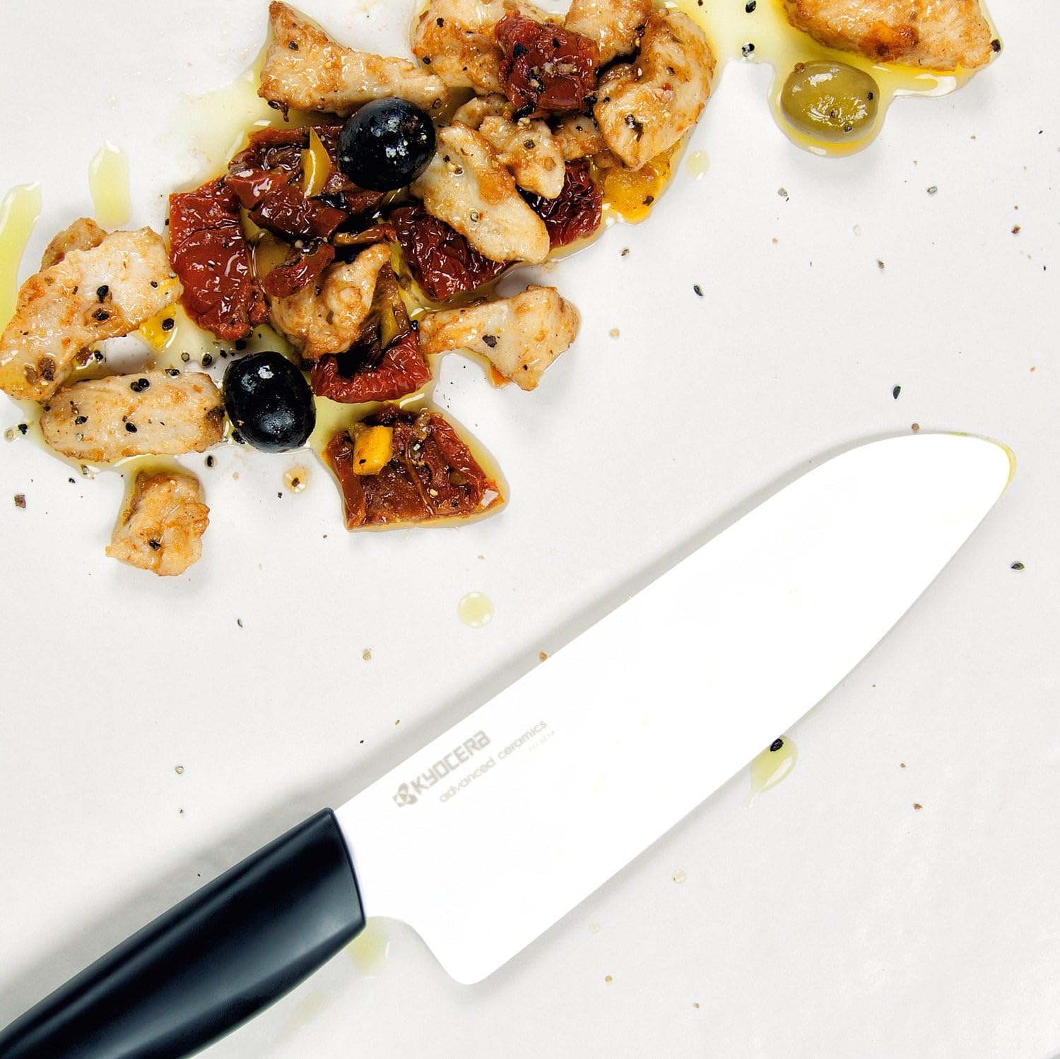 Kyocera FK-140-WH slicing fruits and vegetables for fresh meals.