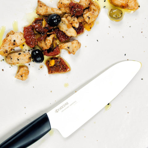 Kyocera FK-140-WH slicing fruits and vegetables for fresh meals.