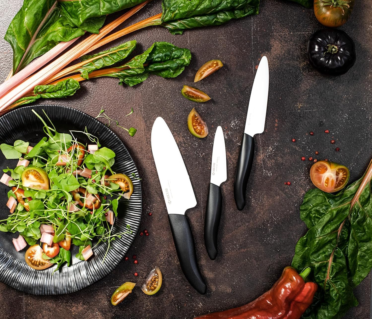 Kyocera FK-3PC BK 3-inch paring knife close-up for detailed prep tasks.