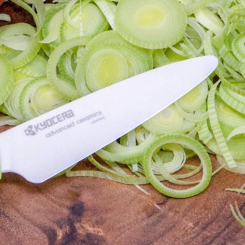 Kyocera paring knife dicing herbs and tiny vegetables with precision.
