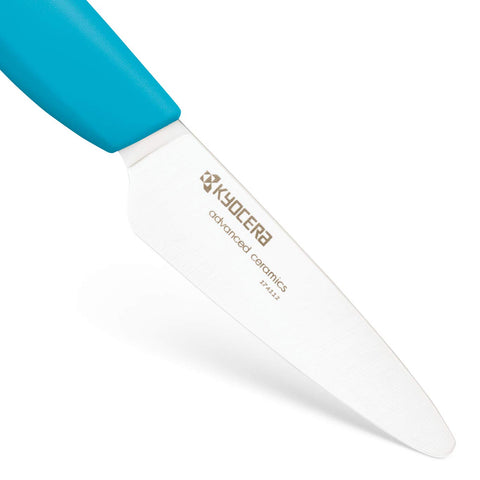 Kyocera Revolution Series blade close-up shows ultra-sharp zirconia edge.
