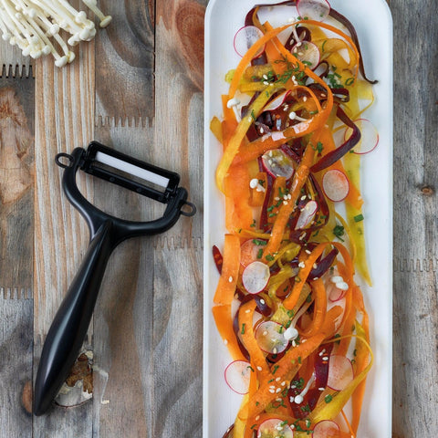 KYOCERA Y-Peeler countertop image emphasizes compact, lightweight design for everyday kitchens