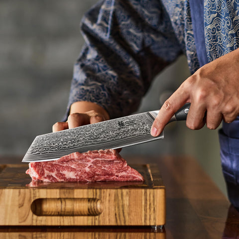 KYOKU Kiritsuke knife balanced design reduces fatigue during prep.