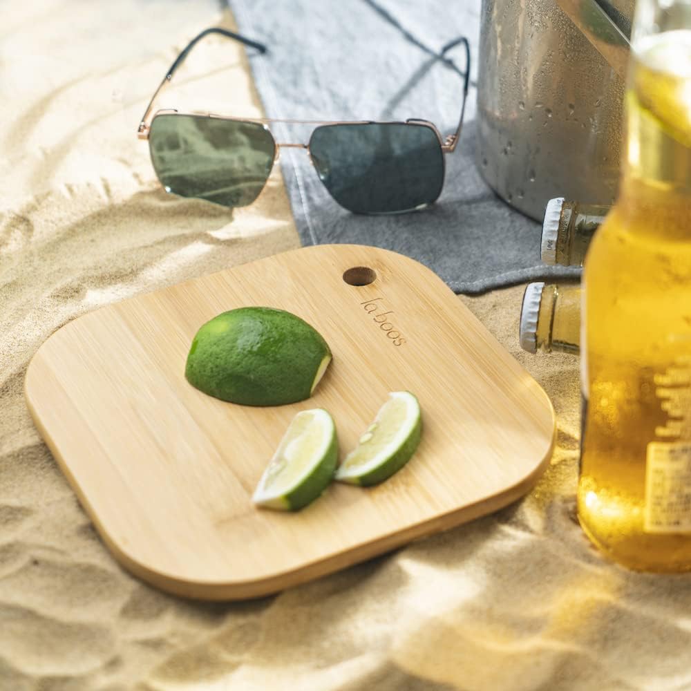 Laboos smooth surface resists sticking when slicing fruits and biscuits.