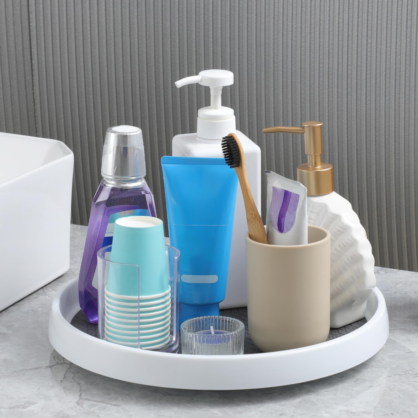 LANDNEOO bathroom vanity organizer holds toiletries with a stable turning base
