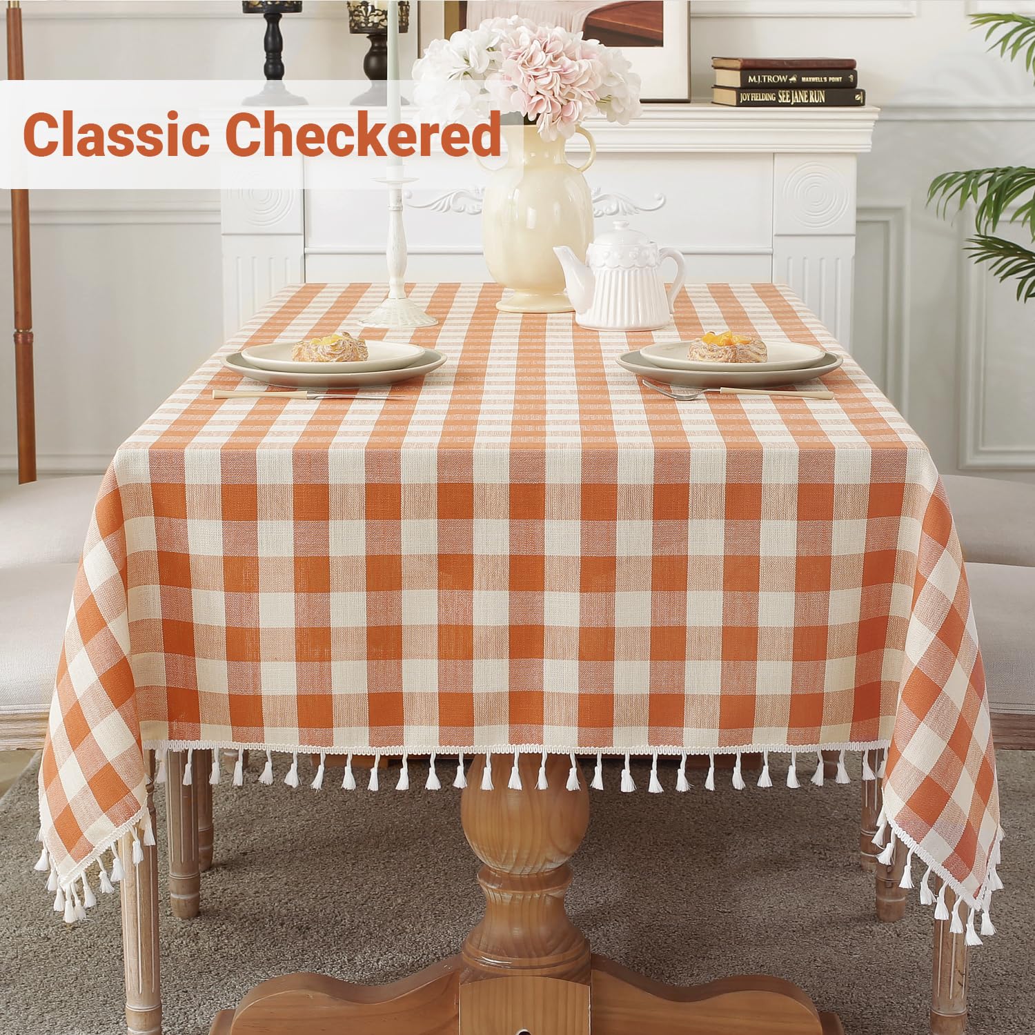Laolitou buffalo plaid orange tablecloth adds bright warmth to any rectangle dining space.