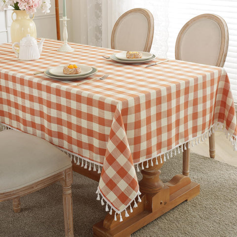 Laolitou checkered fall tablecloth in orange showcases buffalo plaid for cozy farmhouse dining.