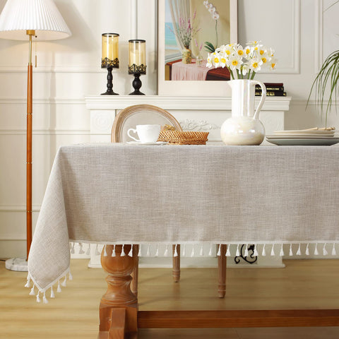 Laolitou embroidered pattern and fringe enhances refined table styling