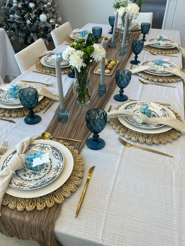 Laquedecraft dining setup with round placemats on a table.