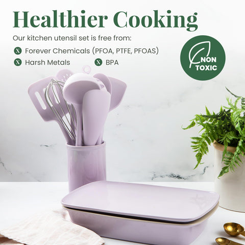 Larder and Vine lavender silicone spatula protecting nonstick pans during flipping.
