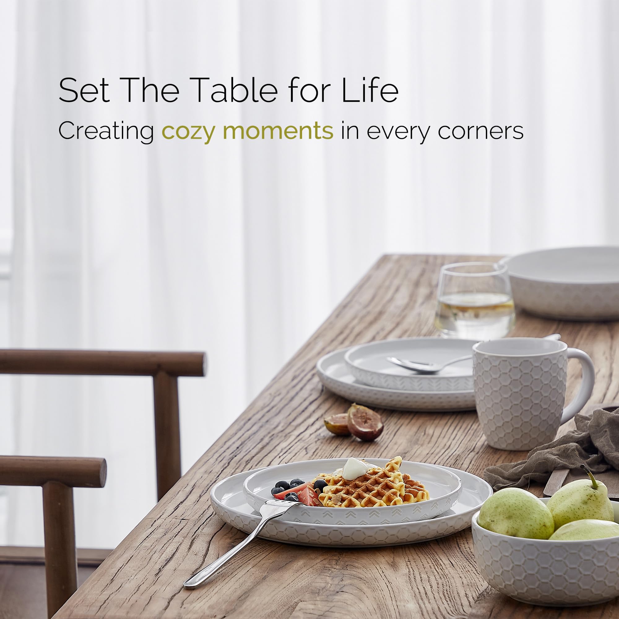 Lareina stoneware salad plates in ivory offer everyday reliability and charm.