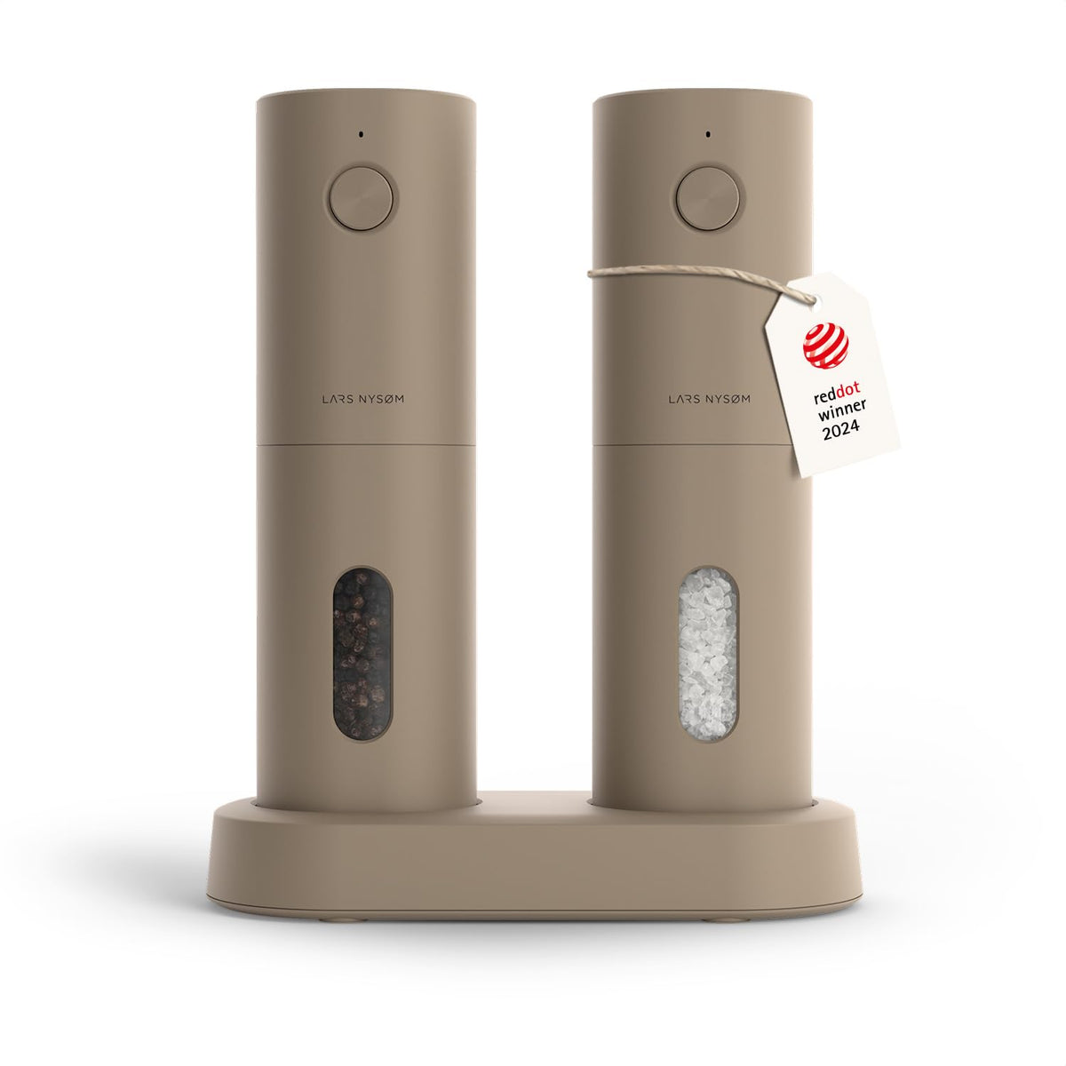LARS NYSØM Spaending electric salt and pepper mills on a kitchen counter for easy seasoning.