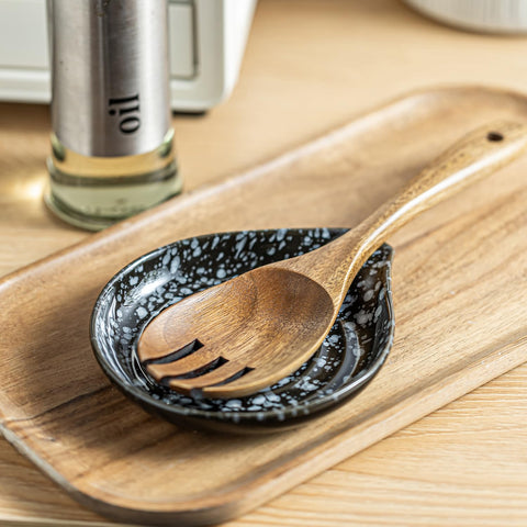 LAUCHUH black starry spoon rest on countertop enhances modern styling.