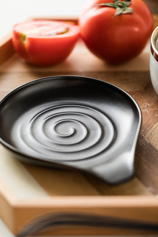 LAUCHUH heavy ceramic spoon rest for stable countertop placement.