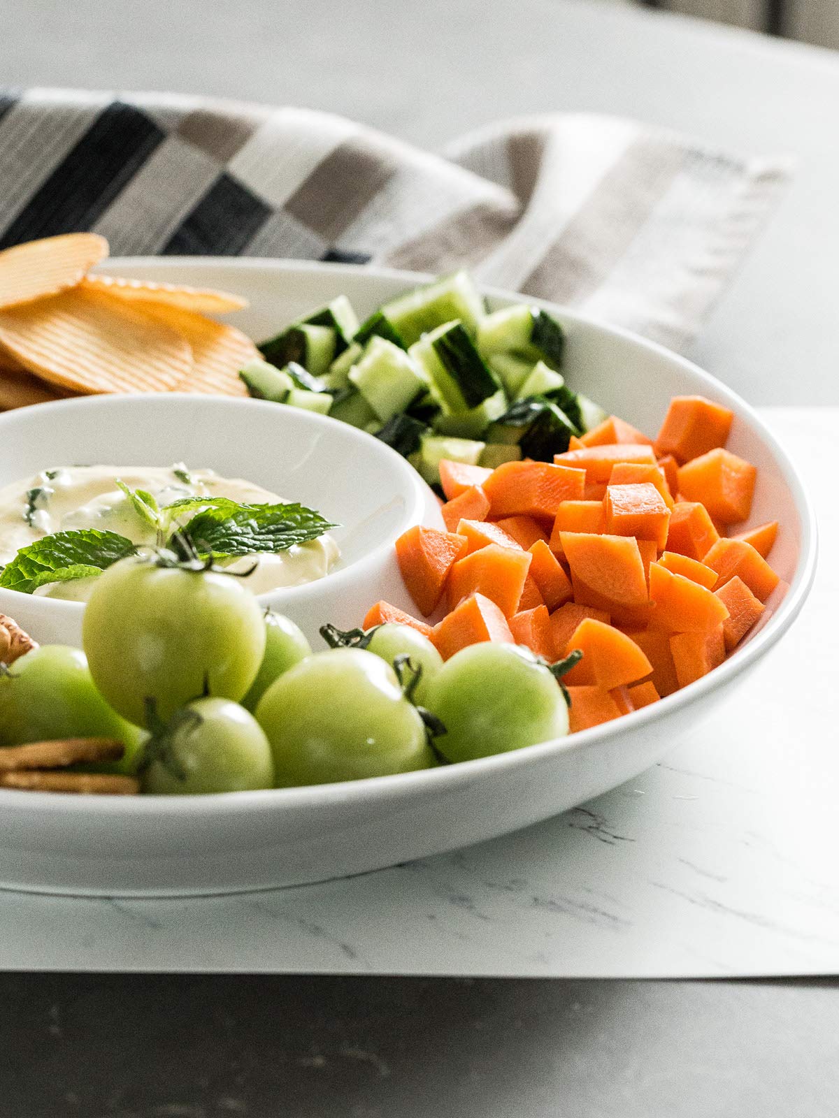 Lauchuh Thanksgiving cheese board style with chips and dip centerpiece.