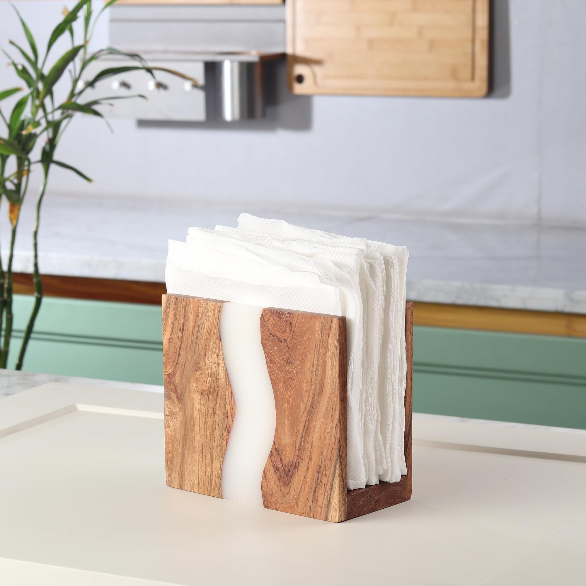 Handcrafted LAVAUK napkin holder showing unique wood grain and epoxy depth.