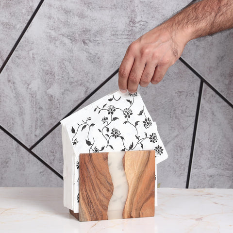 Outdoor-ready LAVAUK napkin holder on patio table with rustic charm.