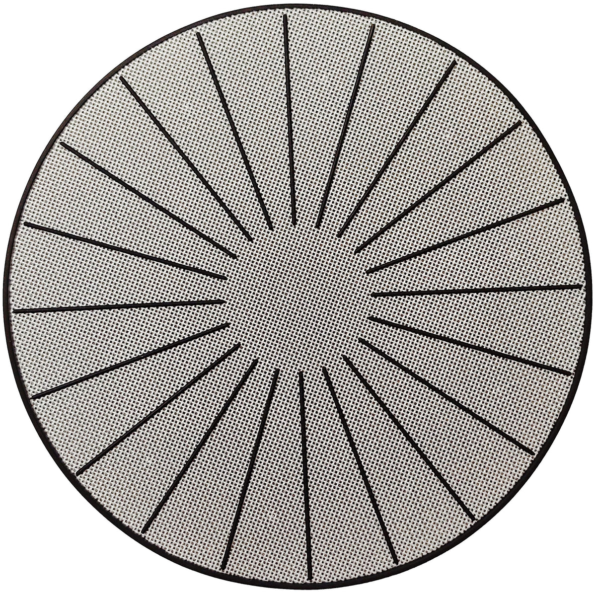 Lazy K induction mat on stovetop providing surface protection and non-slip stability during cooking.