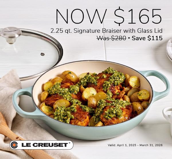 Ergonomic handles on the Le Creuset braiser for safe lifting.