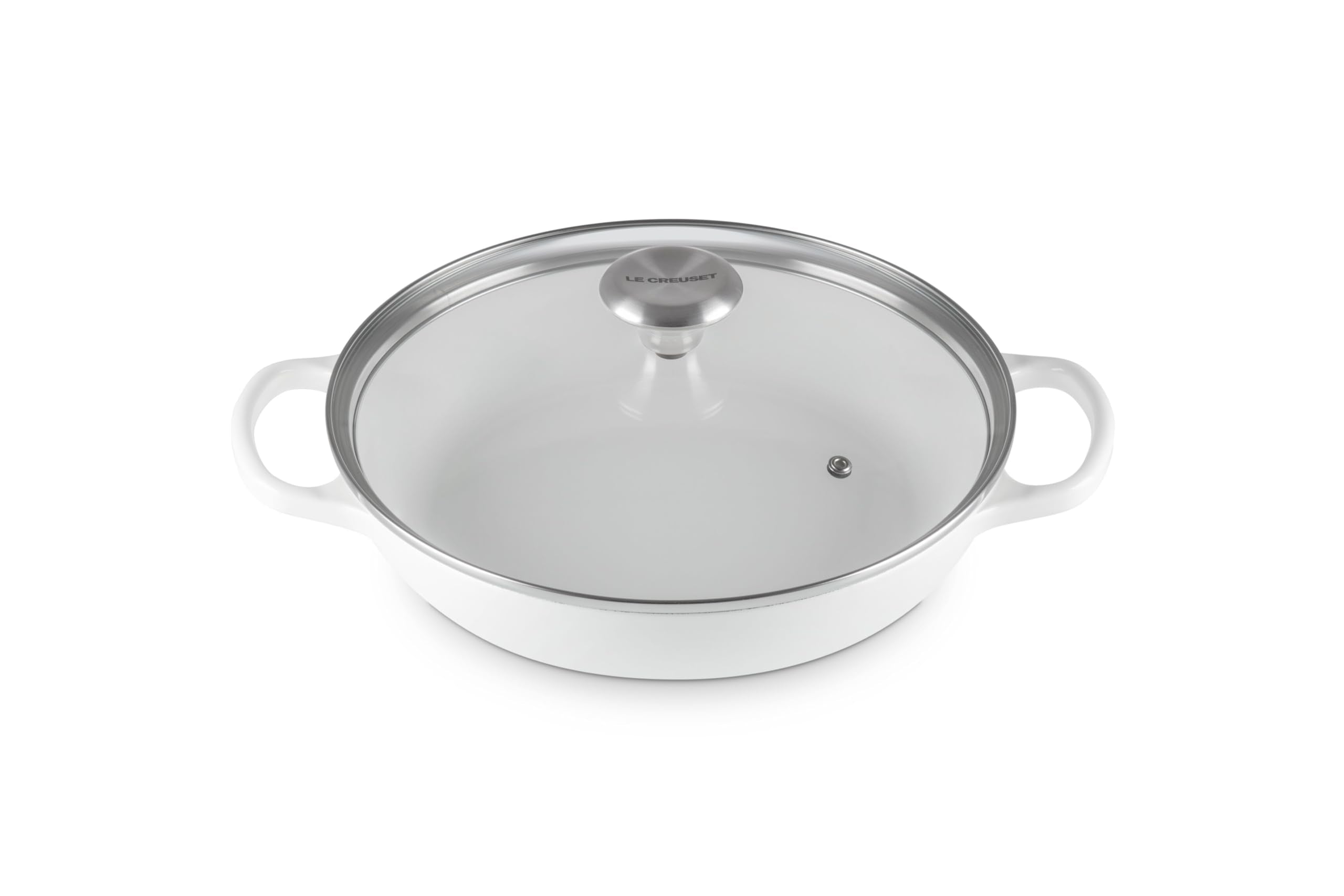 Le Creuset round braiser in enameled iron finish, even heat distribution.