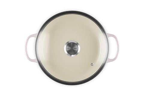 Le Creuset round braiser interior view shows light enamel for easy cooking progress checks.