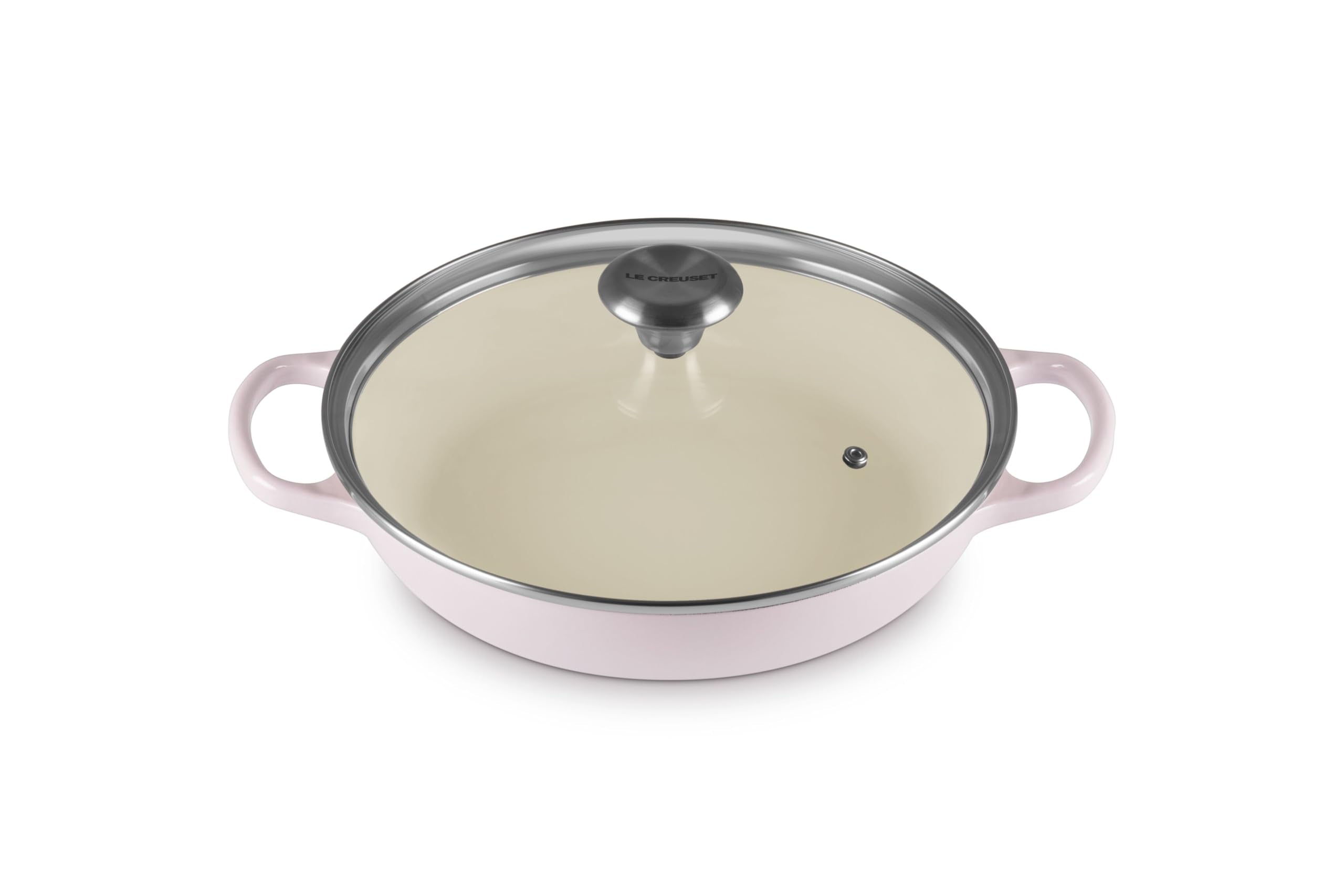Le Creuset Signature round braiser in Shallot with lid on for even heat distribution.