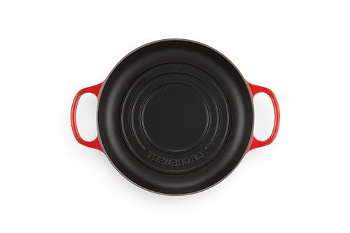 Le Creuset Bread Oven Cerise interior enamel cleans easily after baking.