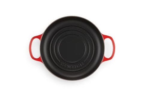 Le Creuset Bread Oven Cerise interior enamel cleans easily after baking.