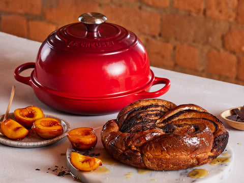 Le Creuset Bread Oven Cerise steam trap enhances aroma and rise.