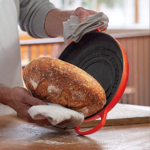 Le Creuset Bread Oven Flame matte interior enamel cleans easily