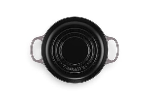 Le Creuset Bread Oven Oyster interior matte enamel seen for easy cleanup