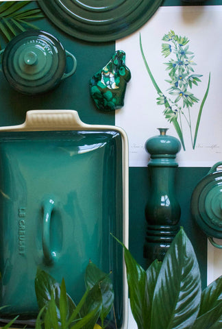 Le Creuset Artichaut butter dish kitchen scene blends with tableware.
