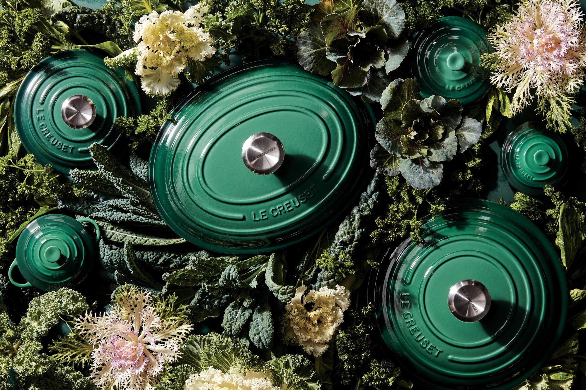 Le Creuset Artichaut butter dish on table ready for serving.