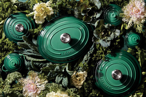 Le Creuset Artichaut butter dish on table ready for serving.