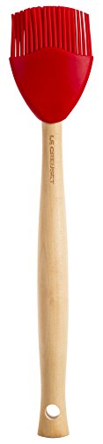 Le Creuset Craft Series silicone spatula with ergonomic handle for comfortable flipping.