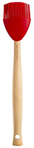 Le Creuset Craft Series silicone spatula with ergonomic handle for comfortable flipping.
