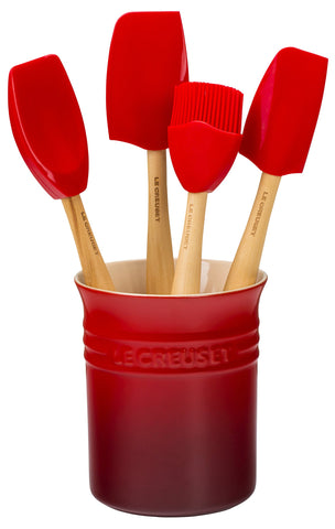 Le Creuset Craft Series stoneware crock with utensils for durable kitchen organization.