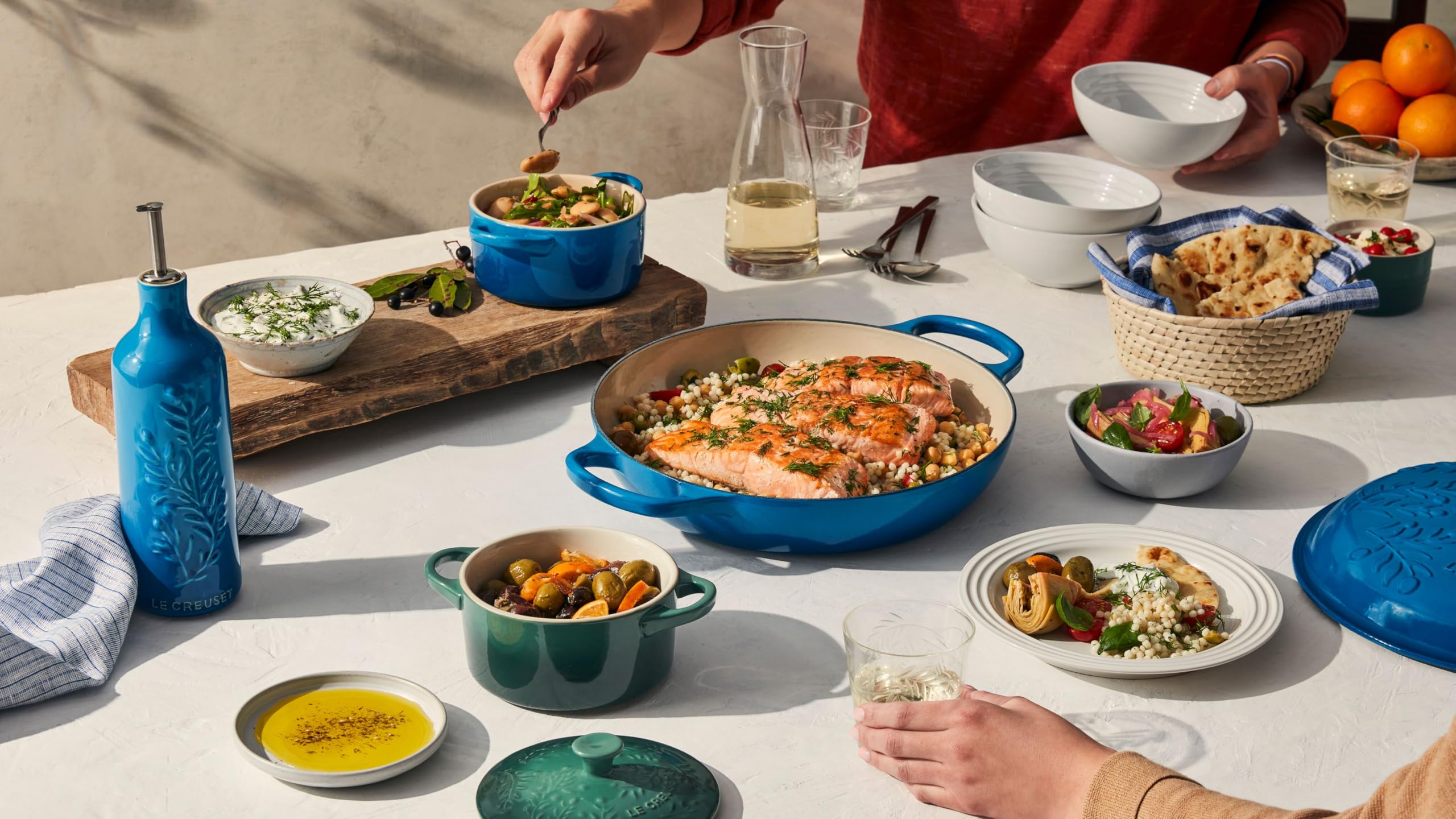Le Creuset durable-glaze finish resists chips and scratches for daily tableware.