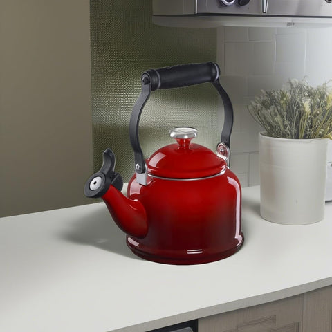 Le Creuset Demi Tea Kettle Cerise compact 1.25 qt size fits small kitchens.